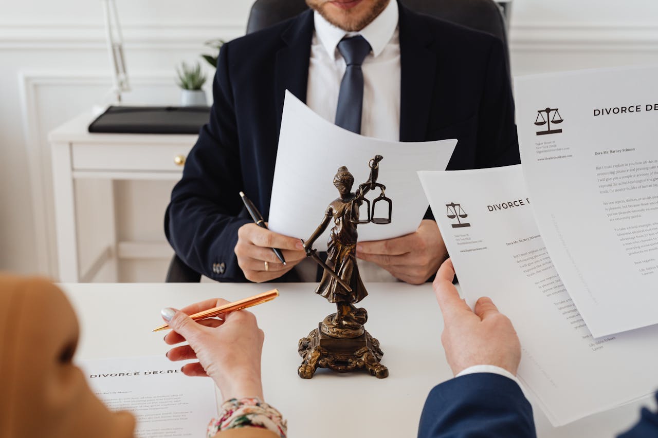 Documents about legal custody and parenting time on a table during a consultation
